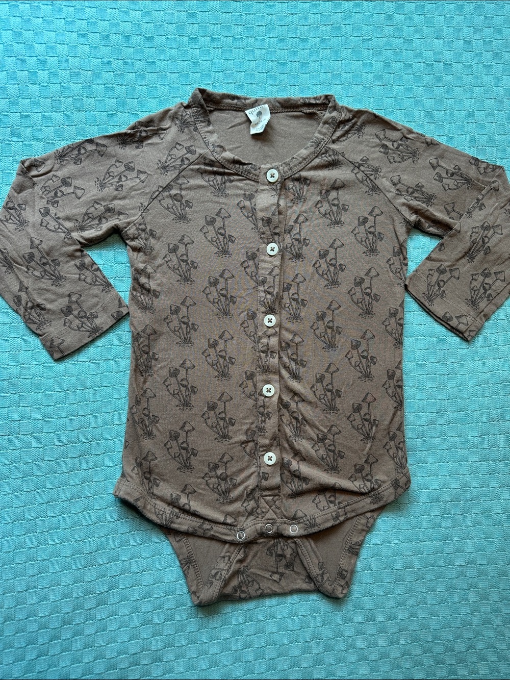 Kate Quinn mushroom bodysuit